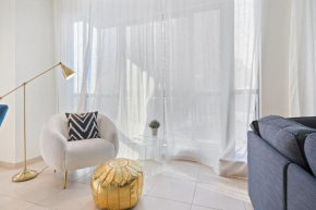 Monty Holiday Home - Bright & Stylish 2BR with Partial Burj Khalifa View
